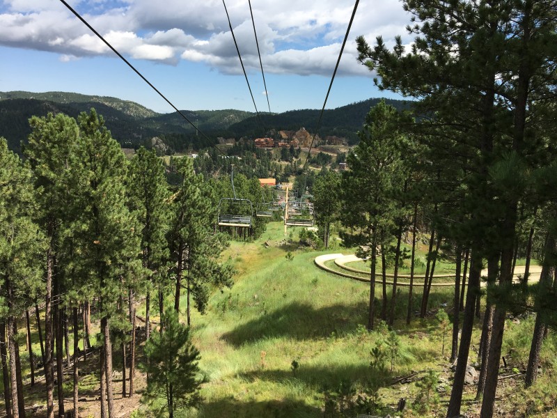 Scenic Chairlift Keystone South Dakota
RUSHMORE TRAMWAY ADVENTURES https://rushmoretramwayadventures.com/attraction/scenic-chairlift/
When we got to the top there was a beautiful garden and place to eat and the views were spectacular.
